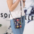 Vertical mini crossbody phone bag in navy blue with colorful cartoon animal print - Animal World
