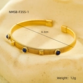 Vintage gold-plated titanium steel cuff with blue beads and pyramid studs variant - Wire Wrapped Gem (NMSB-F355-1)