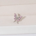 Élégant clip d'oreille papillon argenté orné de zircons roses sur un écrin à bijoux beige - Ear Cuff Zirconium Rose Argenté