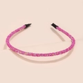 Detail of pink glitter headband with fine sequins and black protective rubber ends - Rose Red