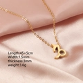 Gold Capricorn zodiac necklace on pink silk with 45+5cm chain length and 1.5mm width - Capricorn