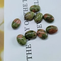 Bulk oval unakite stone cabochons with polished green and red mineral texture - 6*8mm / Unakite