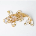Fish figurine crafted in clear resin with elegant gold foil flakes and opal finish - Opal