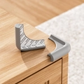 Paraspigoli in silicone grigio a forma di L per mobili con adesivo 3M - Forma L-Grigio