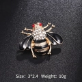 Cute gold-tone honey bee brooch with black enamel and white rhinestones, size 3x2.4cm - Black Rhinestone Bee
