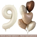 Detail of cream 40 inch number 9 balloon and heart balloons set for party decor - Creamy Number 9 / Number And Heart Balloon Combination