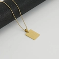 Detail of gold rectangular pendant with Love Each Other More engraving and bead chain - LOVE EACH OTHER MORE