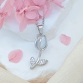 Elegant tulip pendant necklace in silver with cat-eye stone and micro-set diamonds - White Cat Eye Necklace / Silver