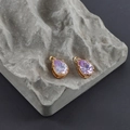 Pair of purple glass waterdrop pendants with 18k gold plating on stone background - Gold Base Purple