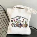 White canvas tote bag for teachers with floral and leopard print lettering on a mesh chair - Style C14