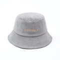 Detail showing the gray corduroy texture and yellow COCONUT embroidery on the bucket hat - One Size / Gray