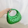 Glossy green acrylic handbag with diamond lattice pattern and curved top handle - Green