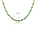 Detailed view of emerald and white cubic zirconia necklace with 33+7cm length marking - Gold Necklace