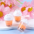 Miniature orange bubble tea keychain charm with realistic black pearls and white lid - Orange & White