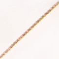 Macro view of gold tennis bracelet featuring rows of colorful faceted zircon gemstones - Light Mixed Colors - Gold