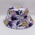 Detail of vibrant floral bucket hat with high-quality stitching on canvas fabric - Purple Orange Green Floral