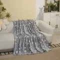 Gray flannel blanket with white star patterns draped over a white fabric sofa - Star / 100*150cm