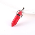 Red natural crystal hexagonal column pendant with silver metal clasp on white surface - Red Jasper