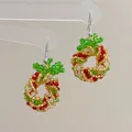 Detail of handmade beaded Christmas wreath earrings with festive red and gold crystal pearls - Christmas Wreath-Ear Hook