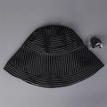 Detail view of striped cotton linen sun hat with an adjustable black windproof chin strap - M (56-58cm) / Black