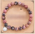 Pink and black spotted stone bead bracelet with silver heart charm on gift card - Rhodonite + Mom Card