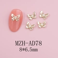 Detailed view of 8x6.5mm gold hollow butterfly nail art charms with tiny rhinestones - Gold Hollow Rhinestone Butterfly (AD78)