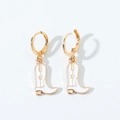 Detail of western cowboy boot earrings with white oil drip finish and star motif - Hoop Earrings / White