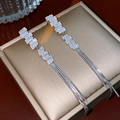 Macro detail of silver tassel earrings with rectangular zircons on champagne jewelry box - Silver (Silver Pin)