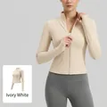 Slim fit long sleeve yoga jacket in ivory white with high collar and full zip - S / Tops / Ivory