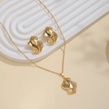 Luxurious gold irregular wavy leaf texture necklace and earring jewelry set on display - Abstract Wave Style (E6142-4)