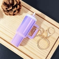 Mini purple gradient tumbler keychain with golden metal clasp on a wooden tray - Dazzling Light Purple / Gold Buckle
