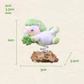 Cute white Capybara horse ornament with green mane and four-leaf clover on spring coin base - Good Fortune Luck Horse (80264)