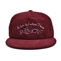 Detailed white embroidery of desert elements on burgundy corduroy baseball cap surface - Burgundy