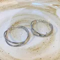 Silver double-layered intertwined hoop earrings with a polished finish for women - A2302 Silver Intertwined Hoops