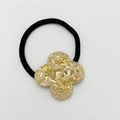 Black elastic hair tie featuring a textured gold clover-shaped alloy metal ornament - Matte Gold - Clover