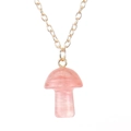 Detailed close-up of a 2cm pink crystal mushroom pendant with a thin gold chain - Watermelon red