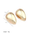 Detailed view of large gold teardrop earrings measuring 4.1cm by 2.6cm and weighing 16g - Gold Large Teardrop Earrings