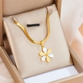 Gold snake chain necklace with white daisy pendant presented in a beige jewelry box - Gold Daisy Necklace (A612)