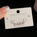 Detailed set of three S925 silver stud earrings featuring heart, bow, and triangle designs - Silver-Rhinestone Bow Heart Set (43#)