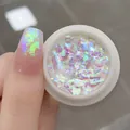 Macro shot of iridescent purple opal nail powder with high-shine aurora glitter finish - Zifu (No. 03 High Shine Aurora Opal Powder)