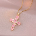 Gold plated cross necklace with pink pear-shaped stones on elegant pink silk fabric - Gold-Pink Zirconia