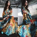 Robe longue à imprimé tropical bleu et jaune avec col en V et manches lanternes - S / Floral Jaune Bleu