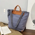 Grey canvas tote bag with brown leather handles and adjustable shoulder strap - Purple