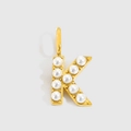 Elegant gold letter K pendant with white pearls on a minimalist white background - Gold-K