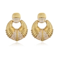 Macro view of gold fan-shaped earrings featuring pave-set crystals and ribbed metal textures - Style C: Gold