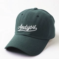Deep green baseball cap with white Andyou embroidery and curved brim for casual wear - Adjustable / Green