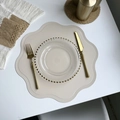 Beige floral faux leather placemat with petal edge and elegant textured finish - Flower Beige