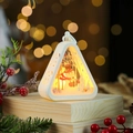 Detail of a white Christmas lantern with warm light and snowman scene on wood table - Snowman / White