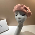 Close-up of pink wool beret featuring elegant pearl and gold bead side decorations - M (56-58cm) / Pink
