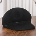 Detail of wool newsboy hat featuring a sequin band and rhinestone bow on wood - M(56-58cm) / Black